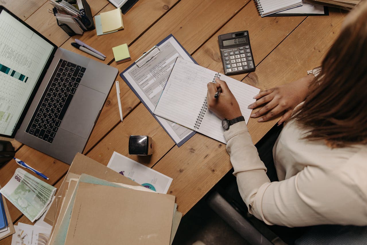 Compliance professionals reviewing documents